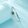 S925 sterling silver open bangle with emerald cut green gemstone and pavé zircons - 925 Silver / Green