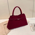 Vintage bordeauxrode suède draagtas met matte afwerking en klassieke gespsluiting - Rood