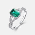 S925 silver twist ring featuring emerald-cut green gemstone with infinity band design - US 7 / Silver