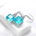 Elegante Ohrhänger aus 925 Silber mit hellblauen Edelsteinen im Smaragdschliff und Zirkonia - 925er Silber / Paraiba-Blau