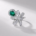 Luxurious S925 silver bow ring featuring a large pear-cut emerald and sparkling diamonds - White Gold Plated (Adjustable Open) / 925 Silver