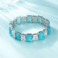 S925 sterling zilveren armband met afwisselend lichtblauwe en witte vierkante stenen - 925 zilver / Paraiba Blauw