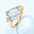 Elegant gold ring with a pear-cut light green gemstone and round side accents - HK13# / Synthetic Green Amethyst