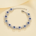 Elegant S925 silver flower bracelet with blue center stones and sparkling white zircons - 925 Silver - 223mm Length / Lab-Grown Sapphire