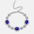 Bracciale in argento S925 con pietre preziose blu ovali e dettagli a fiocco di neve - Argento 925 / Pietra Principale Ovale 6x8mm / Bracciale In Zaffiro Coltivato