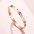 Elegant rose gold stainless steel bangle with inlaid zircons and floral motifs - Rose Gold Clover Outline Zirconia (35-D-9)