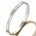 Close-up of silver-tone double T-cuff bangle with pavé-set clear square crystals - Steel Double T Zirconia (52-C-1)