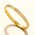 Minimalist gold-plated stainless steel bangle with zircon stones and star engravings - Gold Star Accent Zirconia (46-D-4)