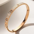 Rose gold stainless steel hinged bangle featuring sparkling crystals in a stylish design - Rose Gold Tone Sparkling Rhinestone