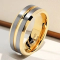 Macro detail of brushed grey tungsten carbide ring with polished gold inner band - US 7 / Gold