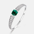 Detail of luxury S925 silver bangle with emerald gemstone and V-shaped pave diamond inlay - 925 Silver / Lab-Grown Emerald (12*12MM Main Stone)