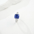 Macro detail of silver ring featuring a blue cushion-cut stone and side diamonds - HK15# / Lab-Grown Sapphire