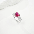 Close-up of heart-shaped ruby silver ring with shimmering baguette side stones - HK Size 15# / Lab-Grown Ruby