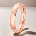 Anillo de acero inoxidable en oro rosa pulido con diseño curvo sobre fondo blanco - US 7 / Acero de titanio / 4mm / Oro rosa