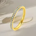 Macro shot of gold plated titanium steel band ring with sparkling crystal inlay - US 5 / Full Circle Pave Zirconia (2.0) / Gold (36-B-1)