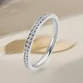 Macro shot of silver titanium steel eternity ring with shimmering pavé set cubic zirconia - US 5 / Full Circle Pave Zirconia (2.0) / Steel Color (36-B-2)