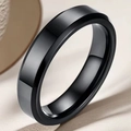 Macro detail of a minimalist black stainless steel ring with polished beveled edges - US 7 / 4mm / Black Beveled Polished