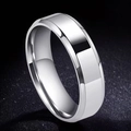 Polished silver stainless steel ring with beveled edges shown from a 45-degree angle - US 7 / 6mm / Steel Double Beveled Polished