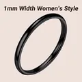 Detail of 1mm black minimalist titanium steel ring showing ultra-slim polished finish - US 5 / 1mm Width / Black