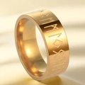 Macro detail of golden stainless steel ring featuring engraved Nordic Viking runes - US 5 / Gold
