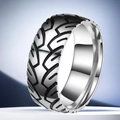 Macro detail of men's titanium steel ring featuring industrial tire tread pattern engraving - US 7 / Steel Color Tire