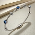 Silver evil eye steel cable bracelet with blue charms and magnetic clasp for women - Steel Evil Eye Style