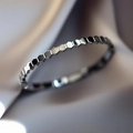 Minimalist silver honeycomb bangle with polished hexagonal pattern in premium titanium steel - Polished-Steel Color