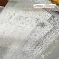 Deko-Spitzenpapier in Cremeweiß mit silbernen Schneeflocken für DIY-Journals 16 Blatt - Cremeweißes Album