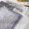 Athener Wind ausgehöhltes Spitzennetz und Papier-Materialset für DIY Scrapbooking - Grauer Vorhang