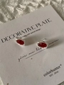 Close-up of geometric silver earrings with teardrop red stones on minimalist card - Silver Red Chalcedony