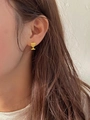 S925 sterling silver gold wine glass stud earrings shown on model earlobe - Gold