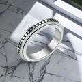 Silver stainless steel 4mm spinner ring with textured black dot details and brushed finish - US 5 / Dot Style (4mm Width) / Silver