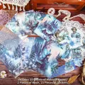Kit scrapbooking Regno di Ghiaccio con 27 pezzi di carta vintage blu, pizzo e adesivi invernali - Regno del Ghiaccio