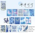 Carta per scrapbook vintage Dream Players con rose blu e farfalle, set da 30 fogli - Viaggio nell'Oceano