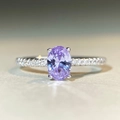 Macro shot of oval purple zircon S925 silver ring with micro-pave setting details - Purple-CBJZ513