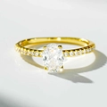 Detailed macro view of an oval-cut gemstone set in a pavé diamond 18K gold ring - Clear Zirconia Gold Color-CBJZ566