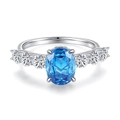 Anillo de plata S925 con gran cristal azul óvalo y brillantes circonitas laterales - US 5 / Aguamarina