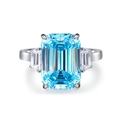 Aquamarin Ring im Smaragdschliff mit Baguette-Seitensteinen aus 925er Sterlingsilber - US 5 / Blau (CBJZ125)