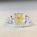 Detail of S925 sterling silver crown ring with a pear-cut yellow gemstone and white diamonds - US 5 / Yellow