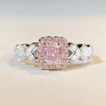 Macro shot of cushion-cut pink gemstone ring with halo diamonds on silver heart band - Size 5 (US Size 5) / Pink Cushion Cut Style (CBJZ350)