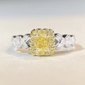 Macro view of a cushion-cut yellow diamond halo ring with intricate diamond-set V-shaped band - Size 5 (US Size 5) / Yellow Cushion Cut Style (CBJZ351)