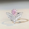 Detailed macro view of S925 silver V-shaped ring with pink pear-cut stone and tiny diamonds - US 5 / Crown Pear Pink Zirconia (CBJZ335)