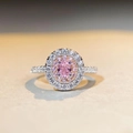 Detailed close-up of a double halo pink oval gemstone ring in S925 sterling silver - US 5 / Pink Rhinestone (CBJZ357)