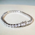 Gedetailleerd beeld van de S925 zilveren tennisarmband met moissaniet stenen - 16cm / 4mm Strass (SL019)