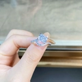 Radiant cut 2 carat sparkling silver ring with V-shaped pavé band on a blurred background - US 5 / White Zirconia (CBJZ431)