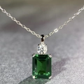 Macro shot of emerald cut green gemstone pendant with O-chain in S925 sterling silver - Pendant Necklace (XL101) / 925 Silver / Green