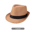Detail of camel linen fedora hat featuring breathable woven texture and black ribbon - Camel