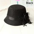 Elegant black cloche hat for women with fabric rose detail and polka dot mesh veil - 58cm / Black