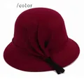 Elegant wine red cloche hat for women with wool texture and decorative leaf accents - Burgundy