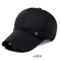 Detail of black cotton baseball cap showing silver metal shield emblem and stitched brim - M (56-58cm) / Black (Metal Badge)